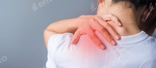 Preview: woman with her shoulder sprain. Shoulder ache, Scapular pain, office syndrome and ergonomic concept