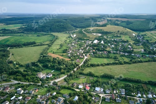 Preview: Aerial landscape view of green cultivated agricultural fields with growing crops