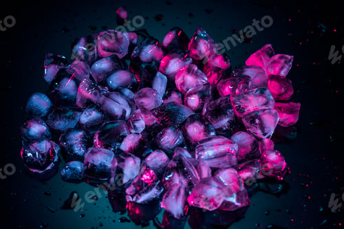 Preview: close up of pink melting ice cubes on black