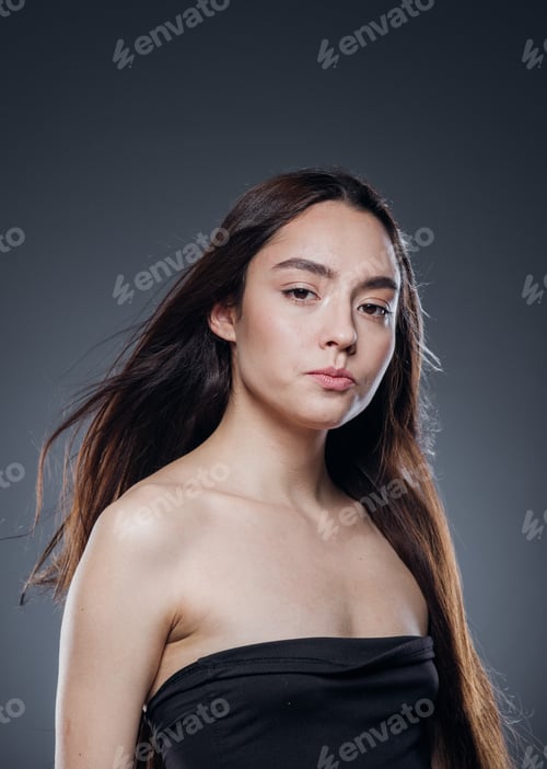 Preview: Beautiful woman smooth long hair brunette natural make up beautiful female portrait dark background
