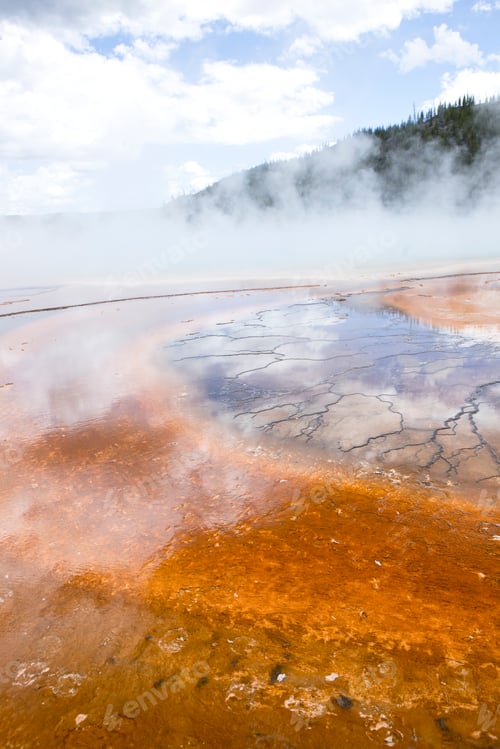 Preview: Steam rises from Grand Prismatic Pool.