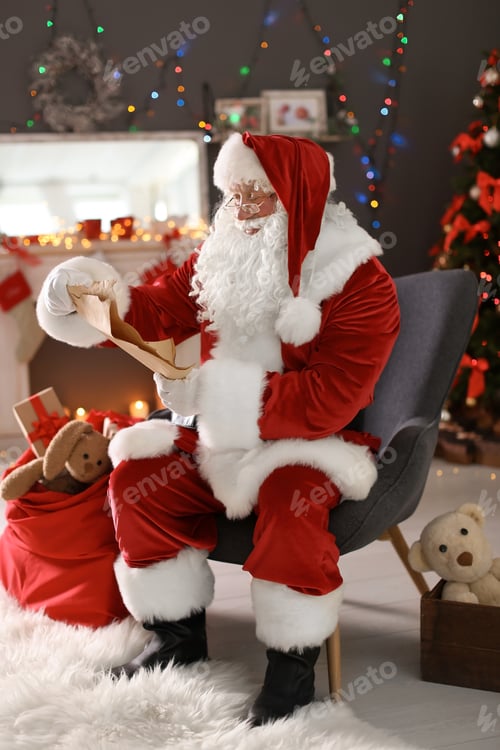 Preview: Authentic Santa Claus reading wish list indoors
