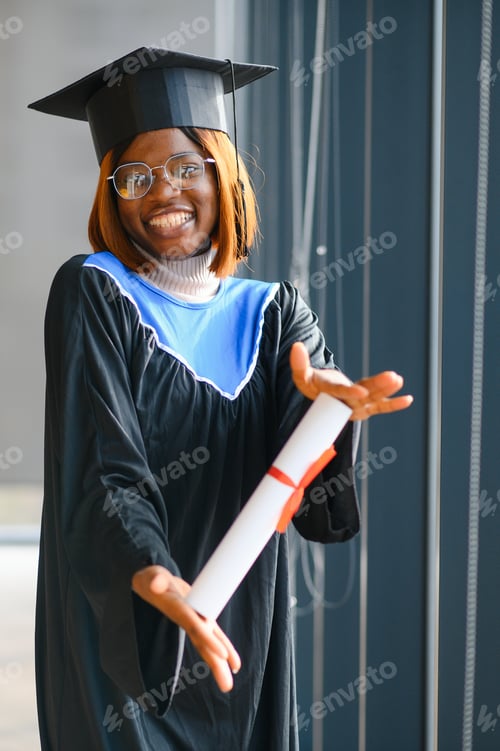 Preview: beautiful young afro american graduate holding diploma