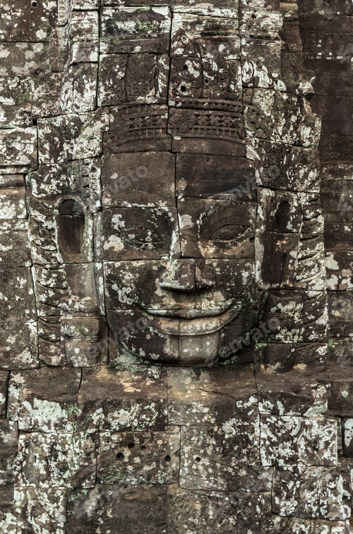 Preview: Closeup the Stone face of Ancient Bayon Temple at Angkor Thom. Siem Reap, Cambodia