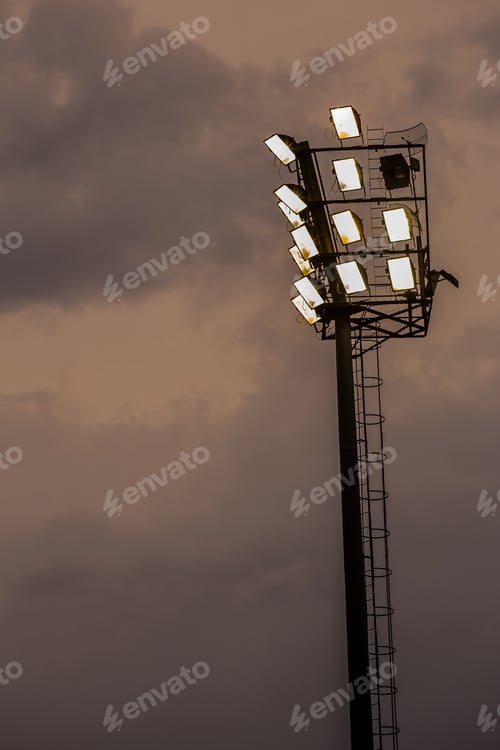 Preview: Stadium light in evening against the cloudy sky