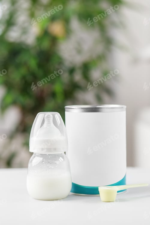 Preview: Baby bottle with formula container and scoop. Baby care.