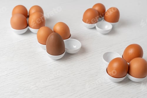 Preview: some raw chicken eggs in the tray with the ch, creative minimal conceptocolate egg s