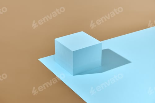 Preview: Cube podium on blue and beige background. Backdrop for product display.