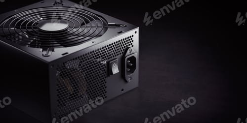 Computer Power Supply Unit on Dark Background