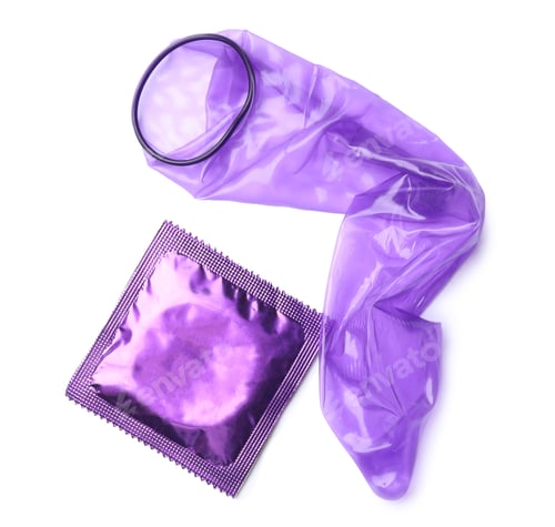 Preview: Unrolled violet condom and package on white background, top view. Safe sex