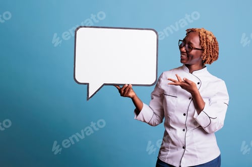 Preview: Female cook pointing to blank dialogue cloud