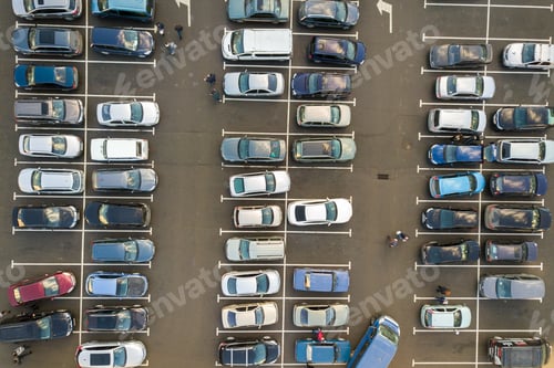 Preview: Top view of many cars parked on a parking lot.