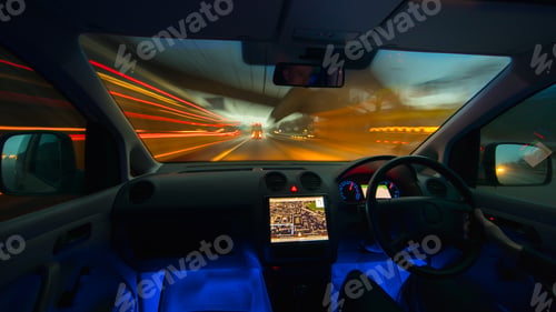 Preview: The man drive a car on the evening highway. Inside view. Left side traffic