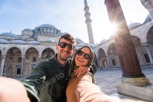 Preview: Happy couple taking selfie at suleymaniye mosque Istanbul
