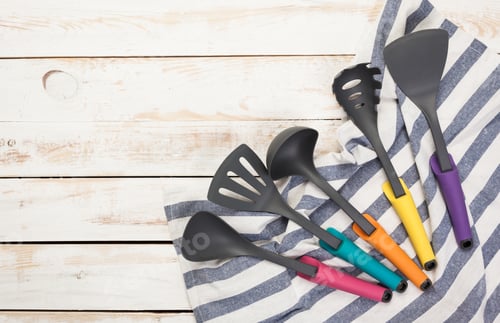 Preview: Various kitchen utensils on wooden table