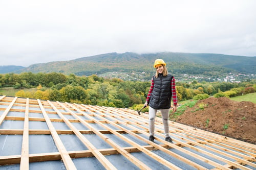 Preview: Young woman worker on the construction site.