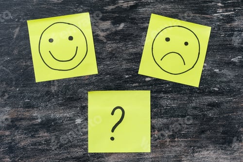 Preview: Hand drawing unhappy and happy smileys. Choice, question mark.