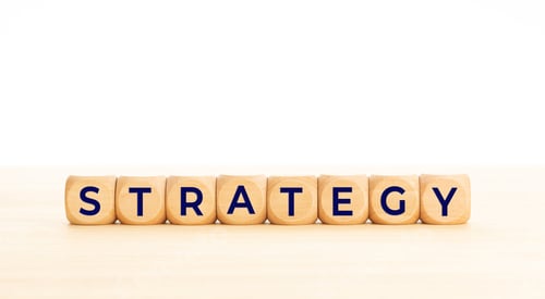 Preview: Strategy word in wooden blocks on table