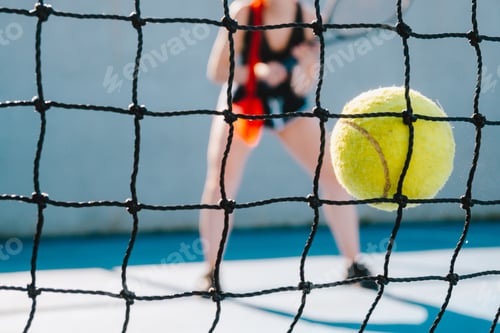 Preview: Amazing shot of a young red-haired female playing tennis