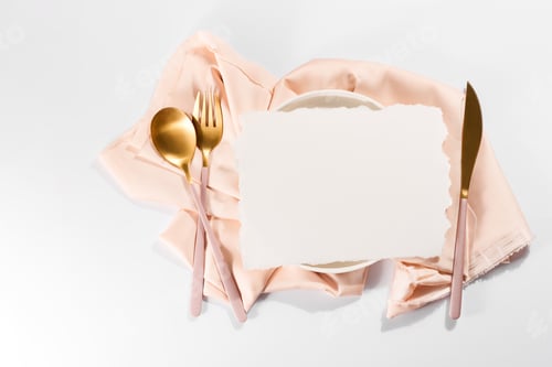 Preview: Beautifully decorated table with white plates, golden apple cutlery on luxurious beige tablecloths