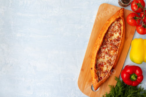 Preview: Turkish baked Pide bread on light blue wooden surface