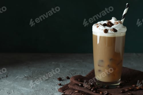 Preview: Concept of delicious drink with ice coffee on gray textured table