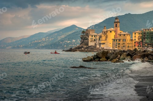 Preview: Mediterranean sea and colorful houses against mountains at Camogli, Liguria, Italy.