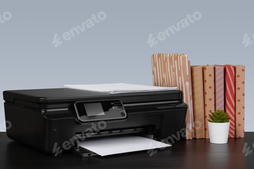 Preview: Compact home laser printer against gray background