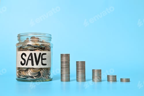 Preview: Coin Saving Concept with Glass Jar and Stacks