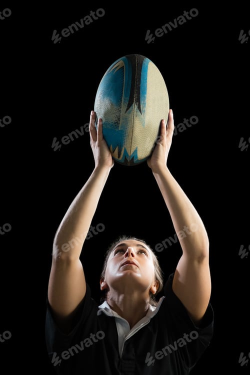 Preview: Female athlete with rugby ball