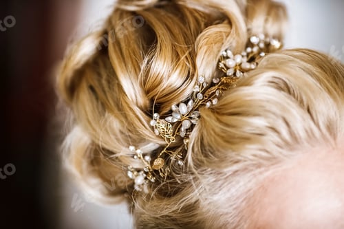 Preview: Portrait of attractive young woman with beautiful hairstyle and stylish hair accessory, rear view