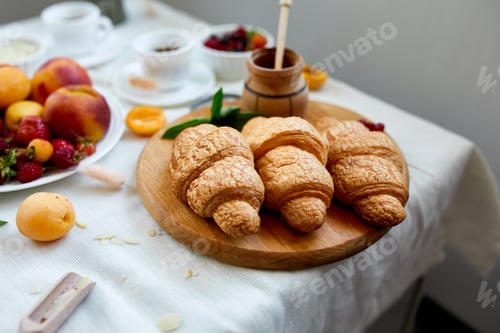Preview: Continental breakfast table served with traditional French croissant