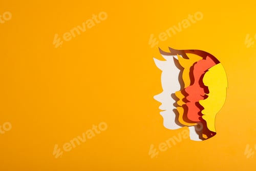 Preview: Children's heads made of paper on a yellow background