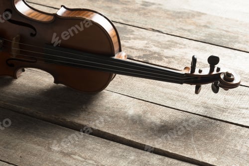 Preview: Violin on a wooden textured table