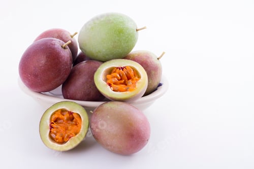 Preview: fruits of gulupa on vine wood table, Passiflora pinnatistipula