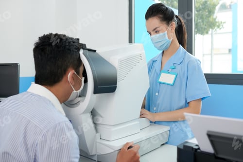 Preview: Optometrist Examining Eyes of Patient