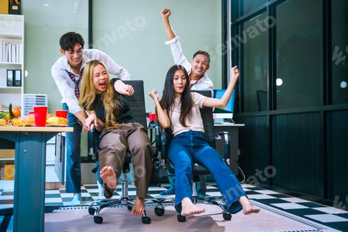 Preview: Four Asian friends, two men and two women, celebrate in an office party. They enjoy a fun-filled
