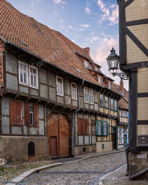 Preview: Cobblestone street with historic buildings in Quedlinburg, Germany
