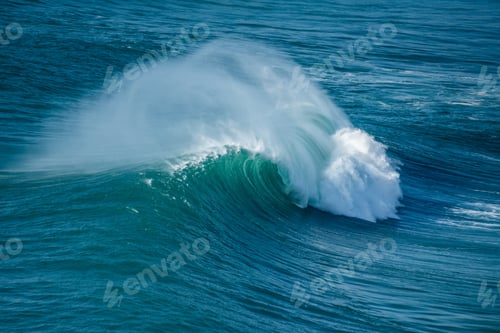 Preview: Surfers sailing in the Atlantic Ocean near the Nazare municipality in Portugal
