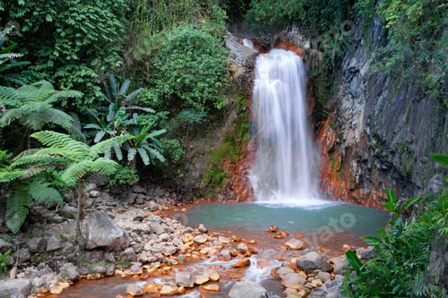 Preview: Stunning image of a majestic Red Rocks waterfall in Negros Oriental, Philippines