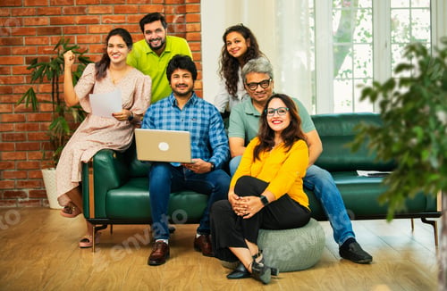 Preview: Young startup team in India celebrating success together in a modern office setting