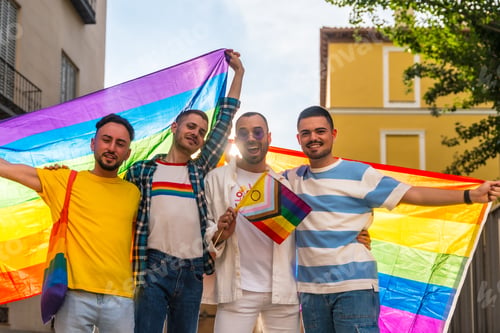 Preview: Portrait of homosexual friends embracing at gay pride party in the city, diversity of young people