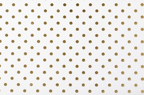 Preview: Gold metallic polka dots repeating pattern on white surface