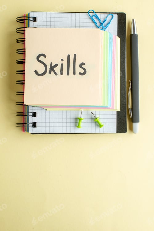 Preview: top view skills written note with colorful paper notes on light background copybook notepad