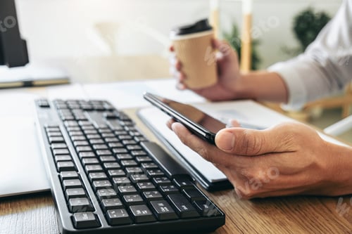 Preview: Businessman working with computer, thinking and analyzing graph