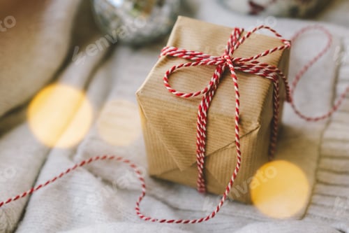 Preview: Wrapped Present with Red and White String