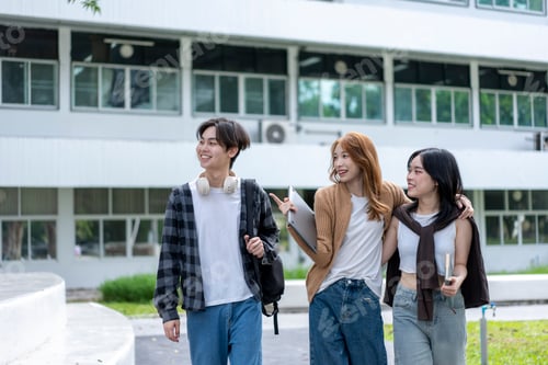 Preview: Three young women are walking down a sidewalk, each carrying a backpack