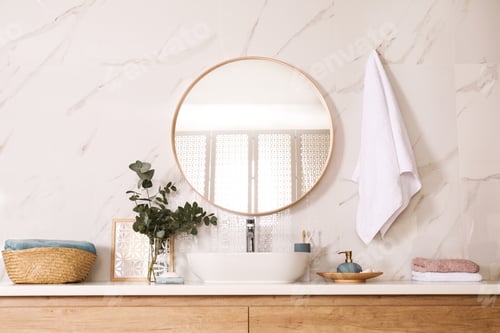 Preview: Stylish bathroom interior with vessel sink and round mirror