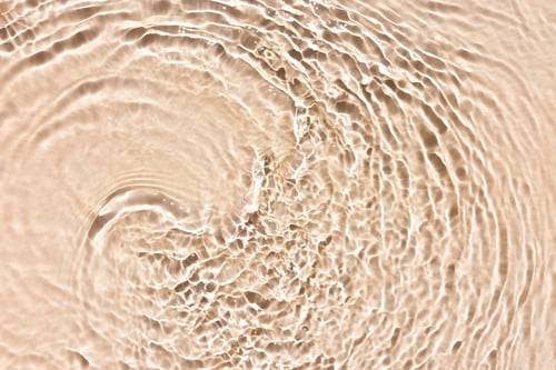 Preview: water texture ripples wave clean transparent water abstract background in beige color