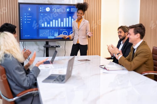 Preview: Employee on job corporate Business colleagues around the table look presentation from large screen